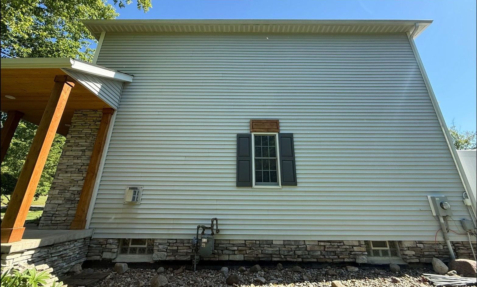 After, the same siding soft washed bright and streak-free by Core Exterior Services