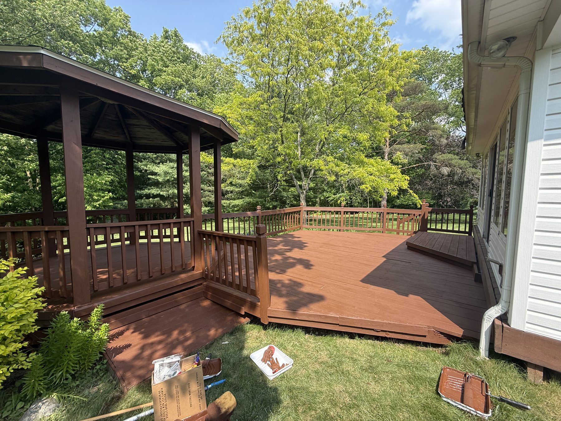 A restored deck with a gazebo by Core Exterior Services
