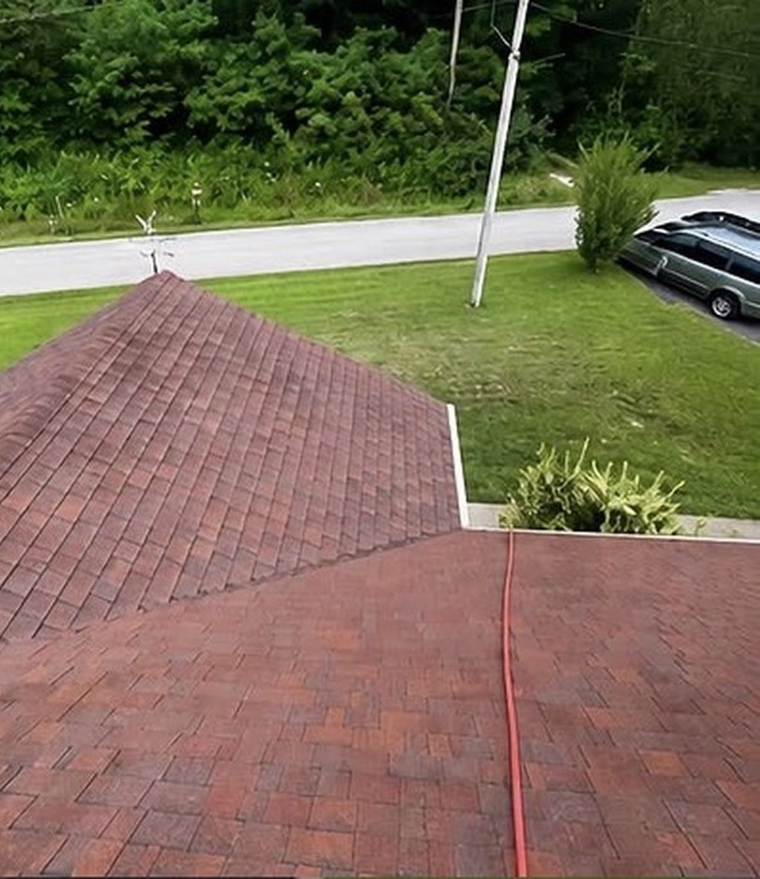 A shingle roof washed clean of moss, algae and black streaks by Core Exterior Services